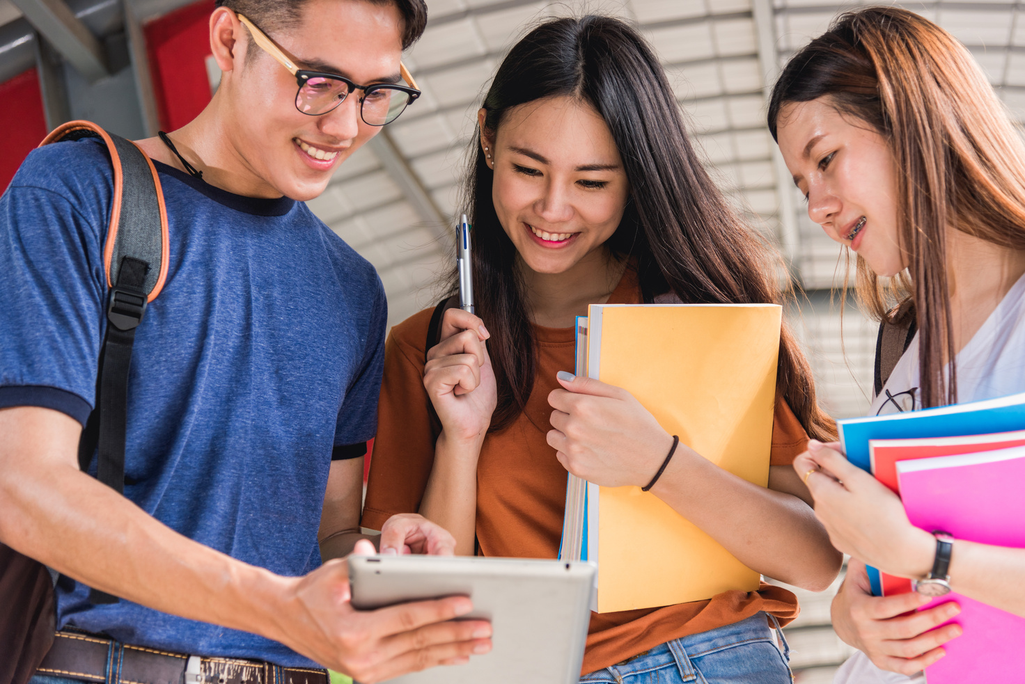 Group Students Studying Outdoors Consult